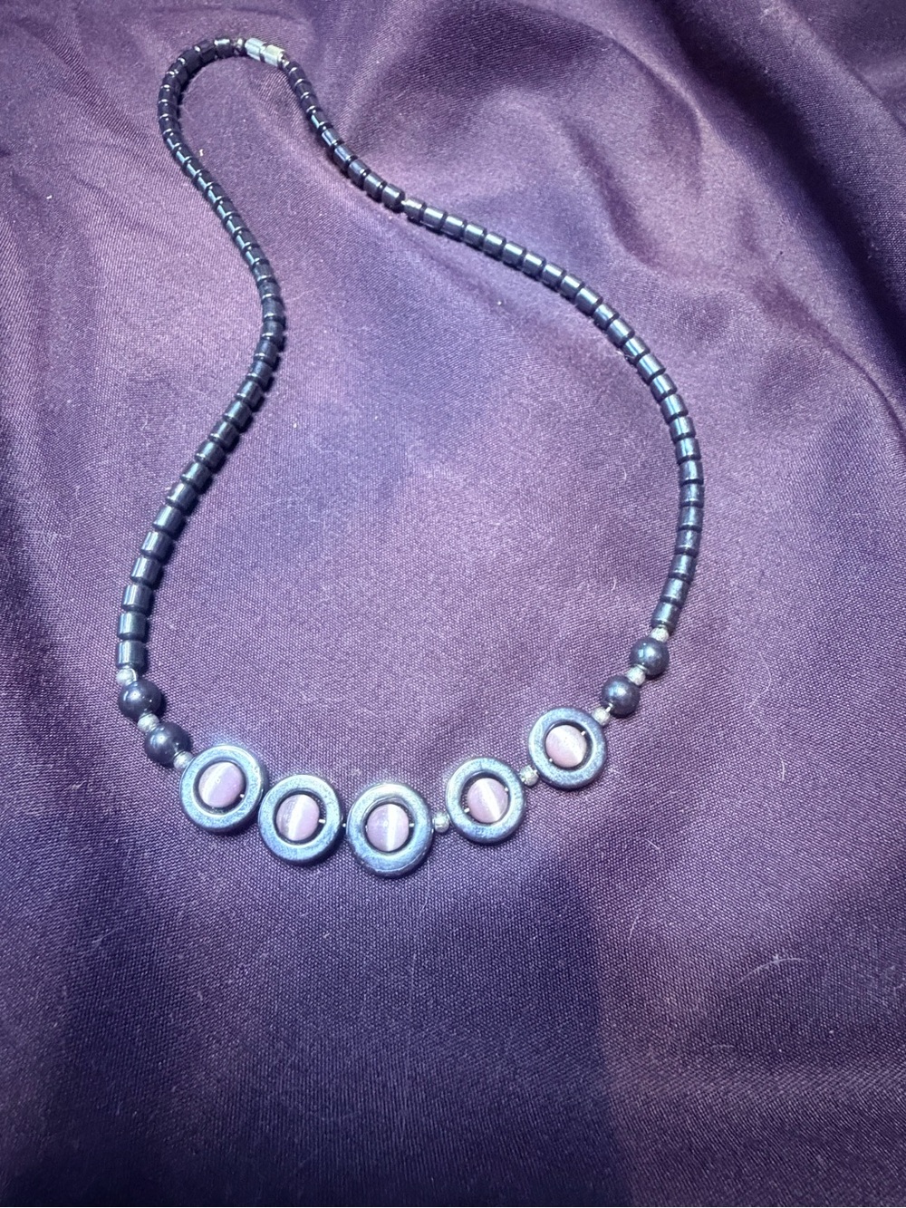 Artisan Black and Purple Beaded Necklace with Circular Centerpieces